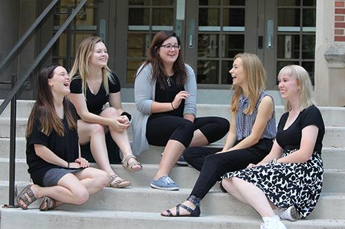 Students talking on steps